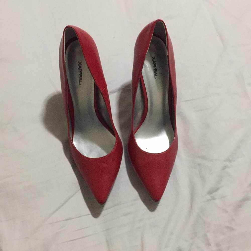 Red pointed toe shoes